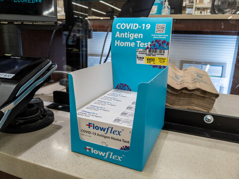 Woodinville, WA USA - circa February 2022: View of Flow Flex brand Covid-19 Antigen test kits for sale at a Safeway pharmacy.