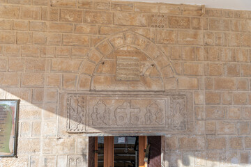 Religious stone carving above the main entrance of The Greek Orthodox Church of the Annunciation in the old part of Nazareth, northern Israel
