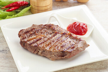 Grilled rib-eye steak beef meat