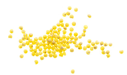 Millet groats isolated on a white background.