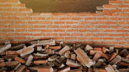 Close-up of the rubble of an industrial building collapsing into a pile of concrete and brick. and the jagged debris caused by the failure of the engineers at the abandoned construction.