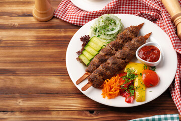 Delicious lula kebab on a wooden table