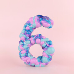 Creative number six 6 concept made of colorful pastel balloons. Balloon font concept on pastel pink background.