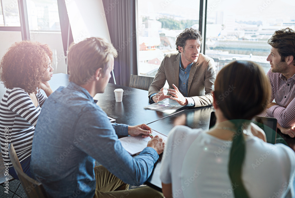 Poster the ideas are flowing.... shot of a group of coworkers having a brainstorming session in an office b