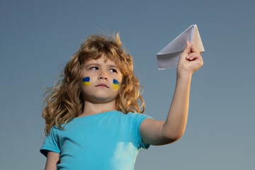 Close the sky over Ukraine banner. No fly zone over Ukraine. Close sky help now and Ukrainian flag....