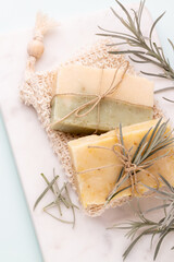 Handmade natural soap on pastel background.