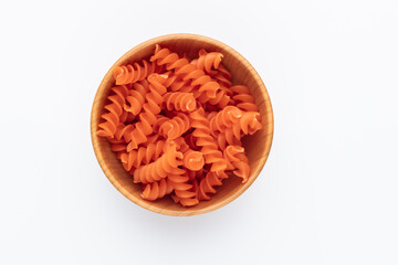 Lentil pasta in a wood bowl.