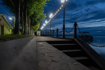 
night embankment with lanterns
