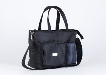 Closeup shot of black bag large baby toddler kid equipment store multifunction multipurpose utility...