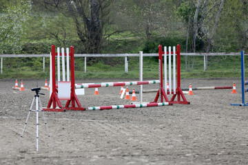 Show jumping poles obstacles, barriers, waiting for riders