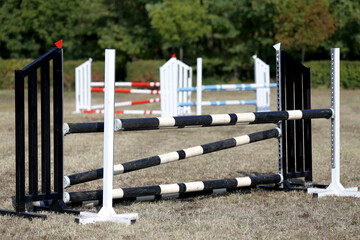 Show jumping poles obstacles, barriers, waiting for riders