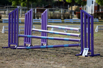 Show jumping poles obstacles, barriers, waiting for riders