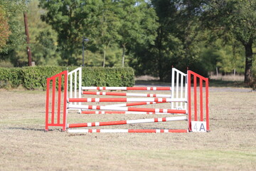 Show jumping poles obstacles, barriers, waiting for riders