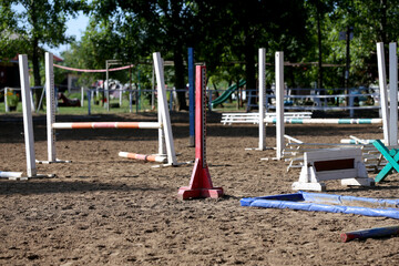 Show jumping poles obstacles, barriers, waiting for riders