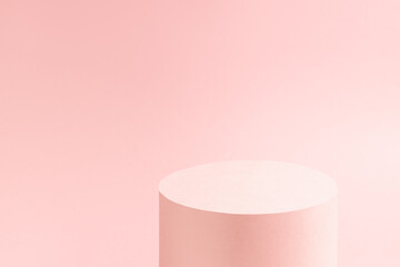 Fashion stylish pastel pink stage mockup with top of one round podium in sunlight with shine soft light wall, copy space. Template scene for advertising, presentation cosmetic products, goods, design.