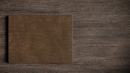 Fototapeta premium Wooden empty food plate on a table - top view. 3d illustration (rendering)