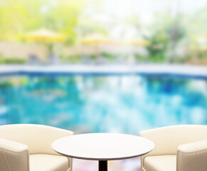 Table Top And Blur Swimming Pool Of Background