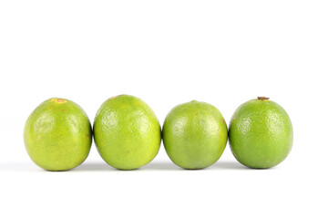 A close-up of limes isolated on white
