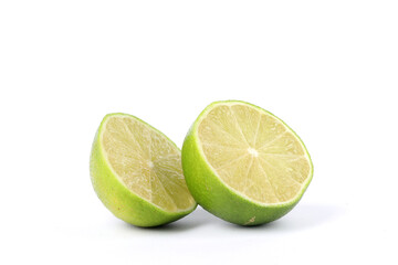 A close-up of limes isolated on white
