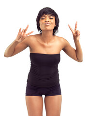 Peace and love to all my sisters out there. Beautiful smiling african woman in a white studio, making peace signs and a kissy-face.