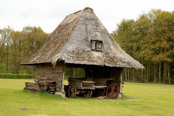 Fototapeta na wymiar traditional barn with wooden cart inside in Bokrijk, Genk, Belgium