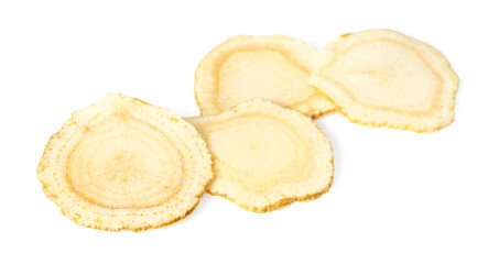 Close up of ginseng slices isolated on white background.