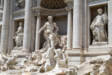 Sea god Oceanus statue in the central niche of famous Trevi Fountain (Fontana di Trevi) in Rome,...