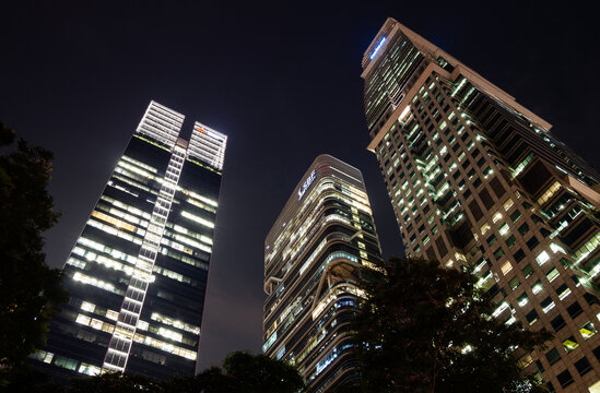 Frasers tower, SBF Center and Capital Tower skyscrapers by night. Financial Downtown Core, Singapore's Central Business District or CBD on April 14, 2019 in Singapore.