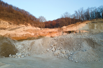 Open pit mining of construction sand stone materials
