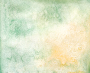Hand drawn watercolor background of natural green with yellow added. watercolor paper