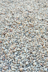 Gray pebble stones abstract background. Many grunge stones, construction rocks texture.