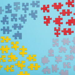 Creative design concept for April 2, Autism World Awareness day. Jigsaw colorful puzzle element, top view, flat lay.
