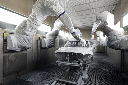 Car bodies are on assembly line. Modern automotive industry. A car being checked before being painted in a high-tech enterprise