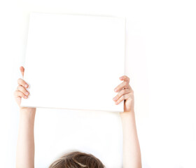 child holding a white board. mockup 