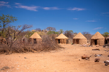 Huts in a museum village of the Himba, Namibia