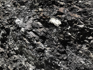 black stone wall for graphic design or wallpaper.