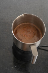 Delicious homemade chocolate in a chocolate maker