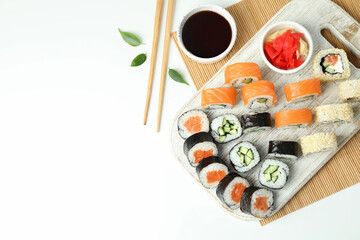 Concept of tasty food with sushi, space for text
