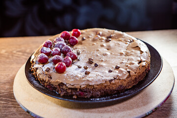 chocolate meringue cake with fresh berries