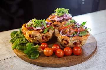 sausages baked in the shape of a hemisphere