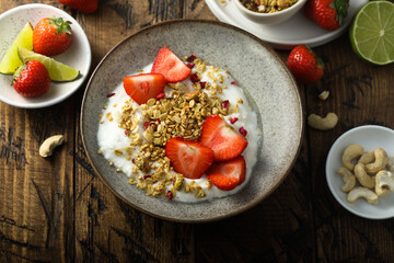 Granola with yogurt and fresh strawberry