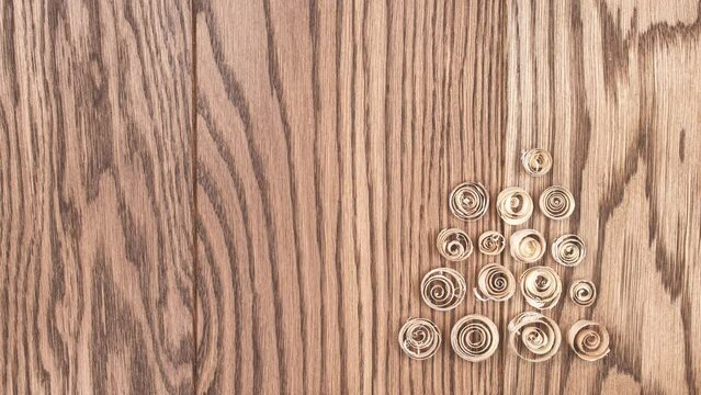 Sawdust appears that folds into spruce. Stop motion looped animation 