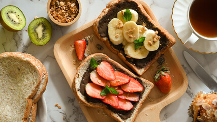 Top view, Healthy brunch concept, Strawberry with chocolate spread toast and banana