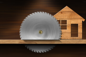 Small wooden model house on a workbench with a metal circular saw blade in motion. Carpentry and Lumber industry concept.