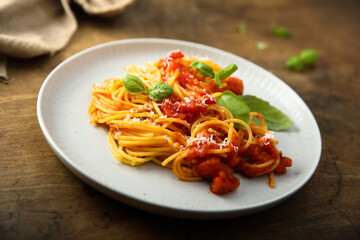 Spaghetti with tomato sauce and basil