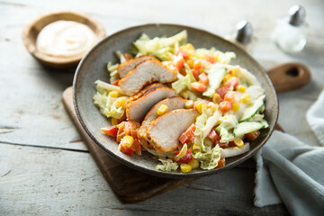Grilled chicken with vegetable salad