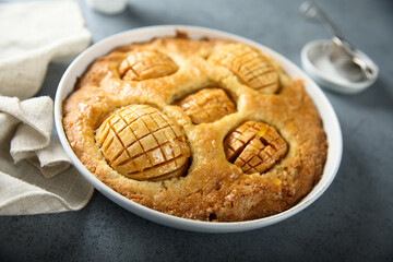 Homemade pie with whole apples