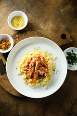 Couscous with hot smoked salmon