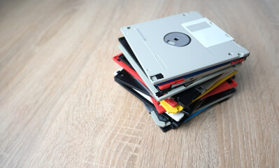 vintage retro electronic data storage devices, from the 80s, 90s flash drives scattered on the...