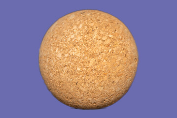 Nice brown cork oak textured ball isolated on the veri peri background,close up,selective focus.